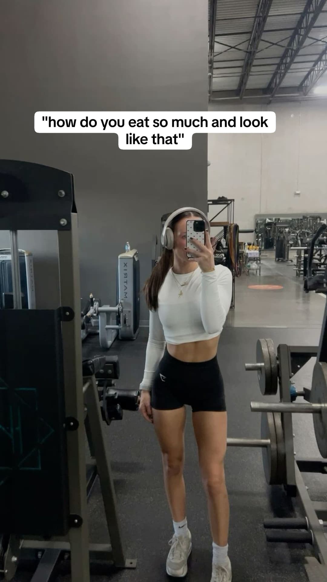 Opening slide with a fitness question over a gym mirror photo