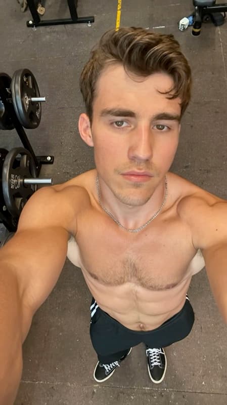Creator at a gym reacting skeptically before the product reveal.